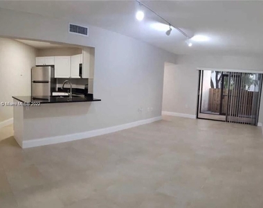 9419 Fontainebleau Blvd - Photo Thumbnail 2