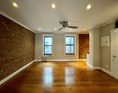 338 East 100th Street - Photo Thumbnail 2