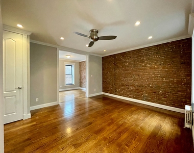 338 East 100th Street - Photo Thumbnail 3