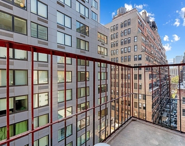 214 West 30th Street - Photo Thumbnail 18