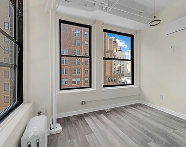 214 West 30th Street - Photo Thumbnail 12