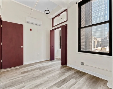 214 West 30th Street - Photo Thumbnail 13