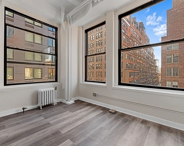 214 West 30th Street - Photo Thumbnail 2