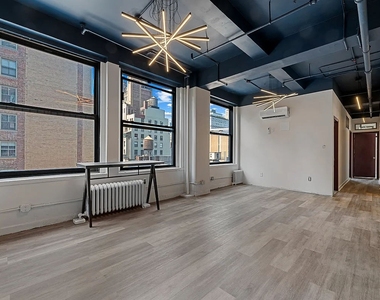 214 West 30th Street - Photo Thumbnail 1