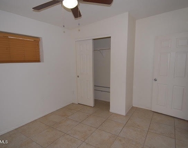 1417 S Jentilly Lane - Photo Thumbnail 6