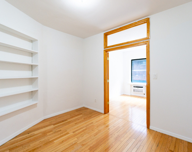 319 East 25th Street - Photo Thumbnail 2