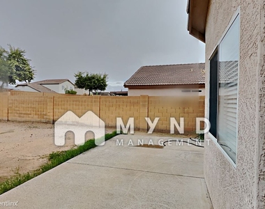 12622 W Myer Ln - Photo Thumbnail 37