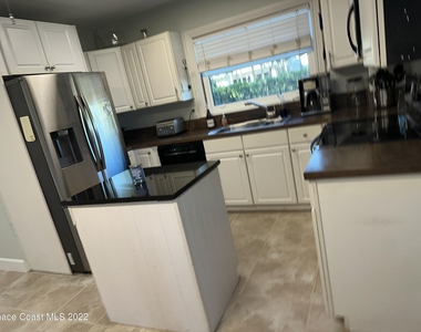 1366 S Banana River Drive - Photo Thumbnail 4