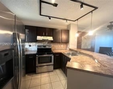 8750 N Sherman Cir Apt 302 - Photo Thumbnail 6