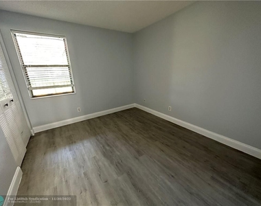 7406 Woodmont Ter - Photo Thumbnail 13