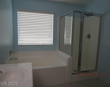 7026 River Meadows Avenue - Photo Thumbnail 9