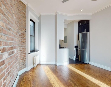 309 East 8th Street - Photo Thumbnail 0