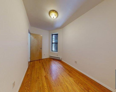 425 East 65th Street - Photo Thumbnail 4