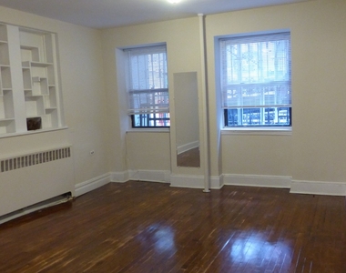 110 E61 STREET - Photo Thumbnail 2