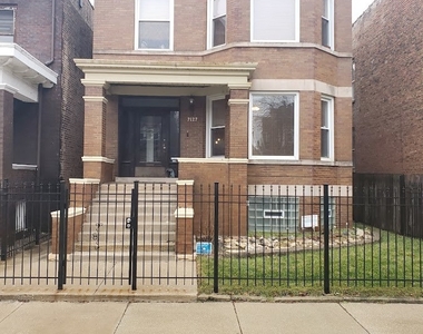 7127 S Eberhart Avenue - Photo Thumbnail 0