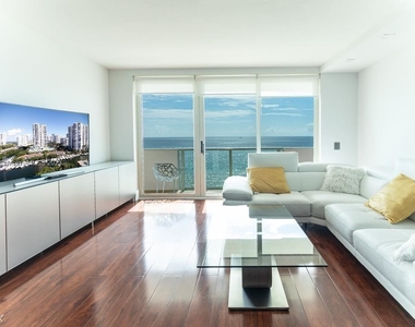 9499 Collins Ave Apt 1001 - Photo Thumbnail 0