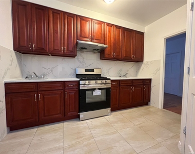64-40 Perry Avenue - Photo Thumbnail 1
