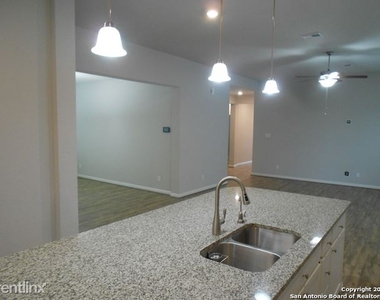 9729 Novacek Blvd - Photo Thumbnail 2