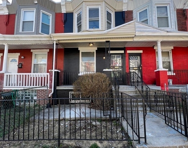 5744 Delancey St - Photo Thumbnail 1