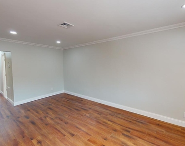85-77 66th Avenue - Photo Thumbnail 2