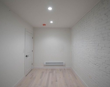 East 6th Street, Unit 2b - Photo Thumbnail 2