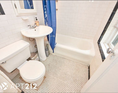 120 E10th St - Photo Thumbnail 6