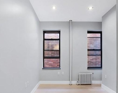 113 East 118th Street - Photo Thumbnail 2