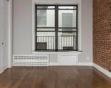 209 East 25th Street - Photo Thumbnail 1