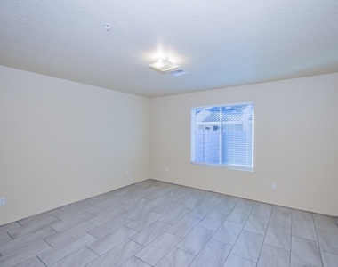7387 E 39 St - Photo Thumbnail 7
