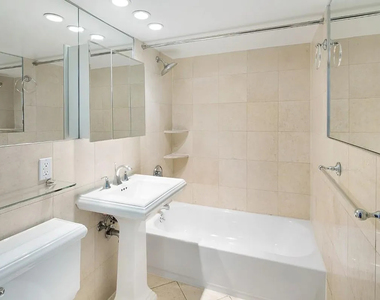 334 East 100th Street - Photo Thumbnail 2