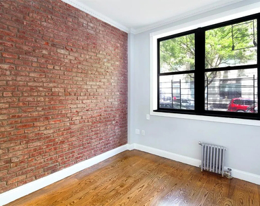 334 East 100th Street - Photo Thumbnail 3