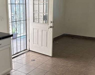 938 E Amelia Ave - Photo Thumbnail 2
