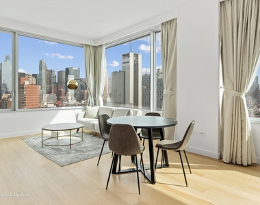 611 W 56th St - Photo Thumbnail 0