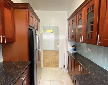 98-51 64th Avenue - Photo Thumbnail 2