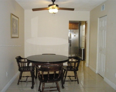 10794 N Kendall Dr - Photo Thumbnail 3