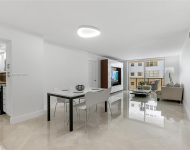 6039 Collins Ave - Photo Thumbnail 4