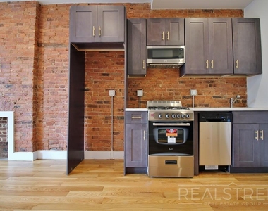 119 Ralph Ave - Photo Thumbnail 3