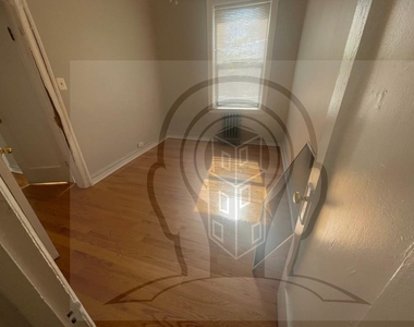 1371 W Estes Ave - Photo Thumbnail 4