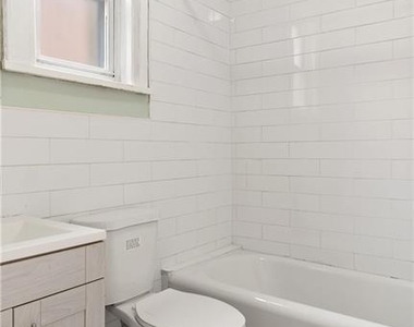 1129 E 221st Street - Photo Thumbnail 4