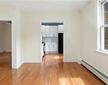 1129 E 221st Street - Photo Thumbnail 6