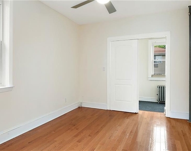 1129 E 221st Street - Photo Thumbnail 13