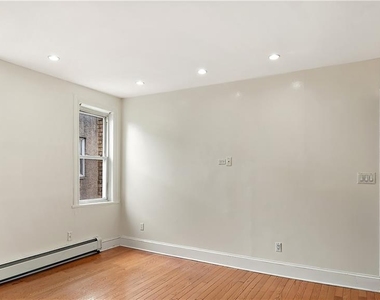 1129 E 221st Street - Photo Thumbnail 8