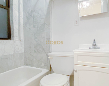 273 E 3rd St - Photo Thumbnail 7