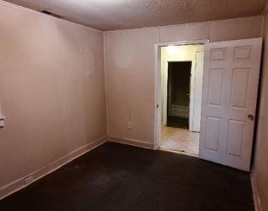 3009 Clifton Ave - Photo Thumbnail 7