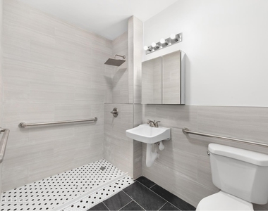 56-50 Myrtle Avenue - Photo Thumbnail 4