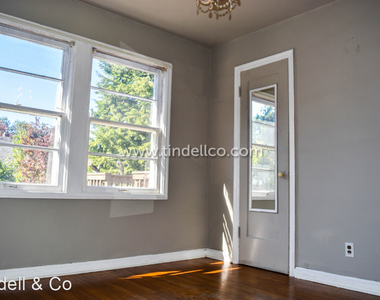 6725 N Delaware Ave - Photo Thumbnail 12