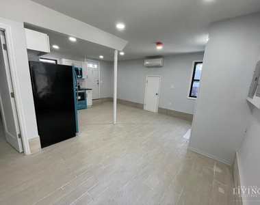 7221 Burchell Avenue - Photo Thumbnail 7