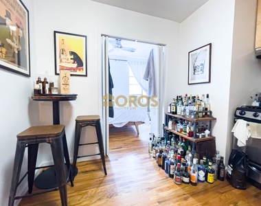215 East 10th Street - Photo Thumbnail 2