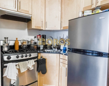215 East 10th Street - Photo Thumbnail 3