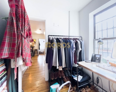 215 East 10th Street - Photo Thumbnail 4